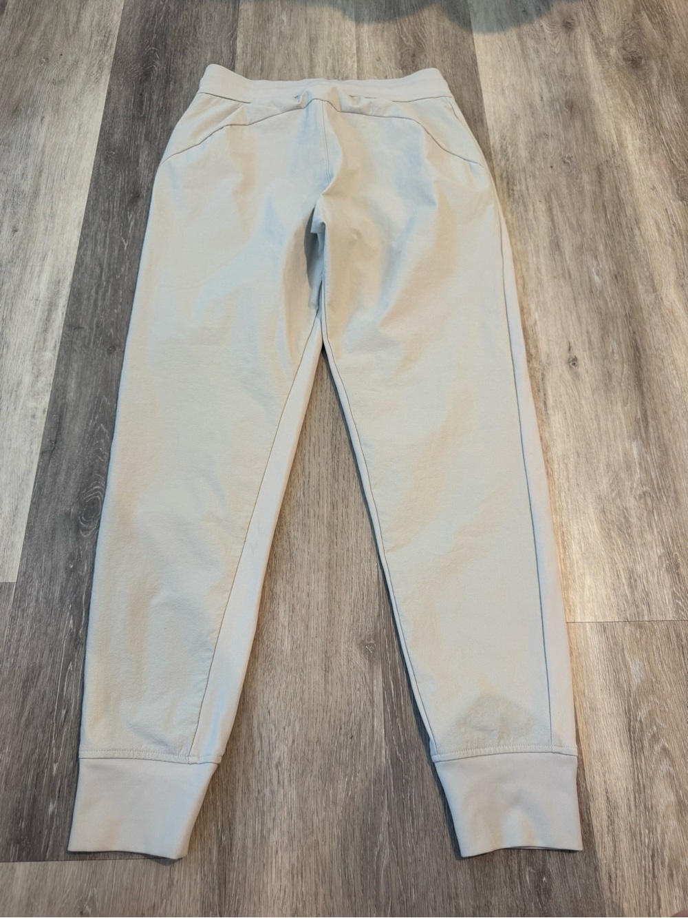 Athleta Headlands Hybrid Trek Joggers in a light beige/abalone color. - Picture 6 of 11